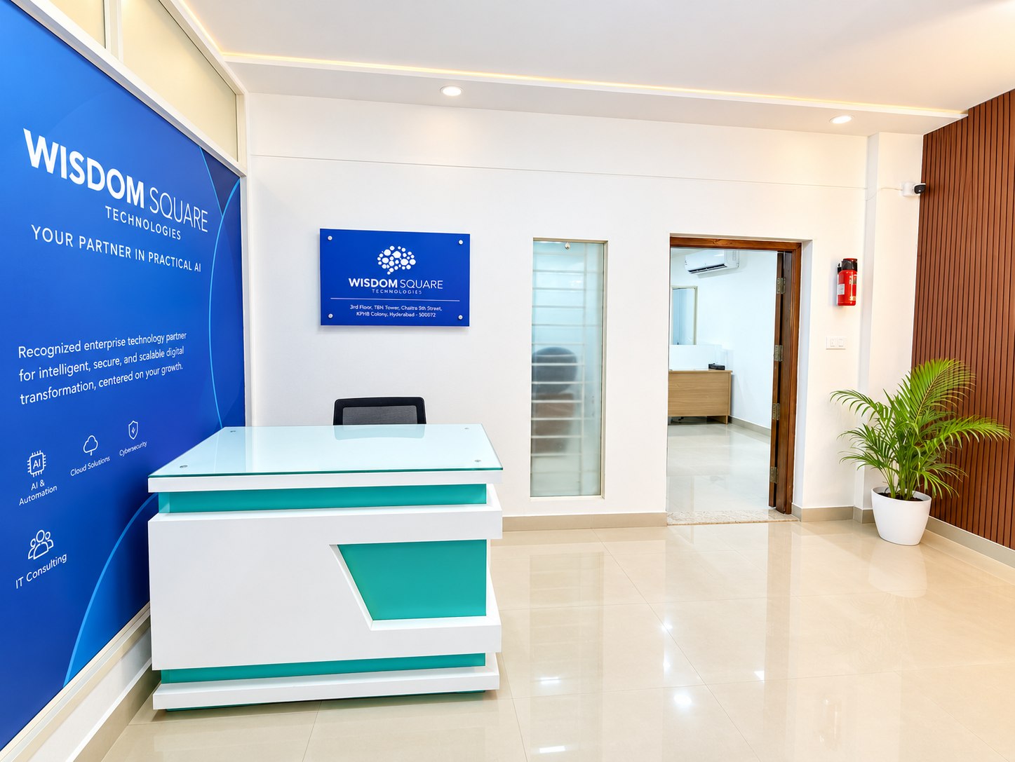 Reception desk and branded wall at the Wisdom Square Technologies office.